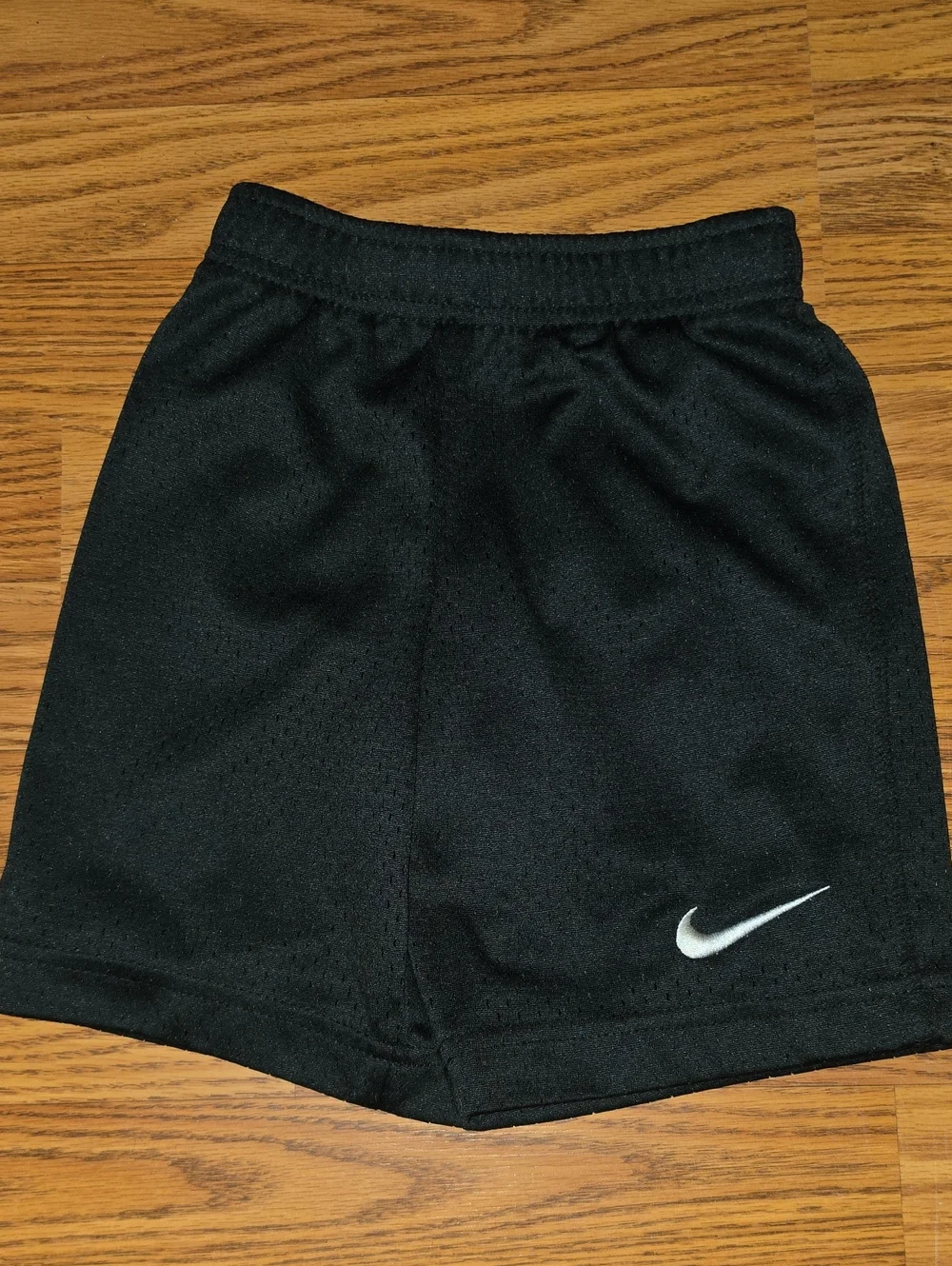 Nike Black Kids' Athletic Shorts with White Swoosh